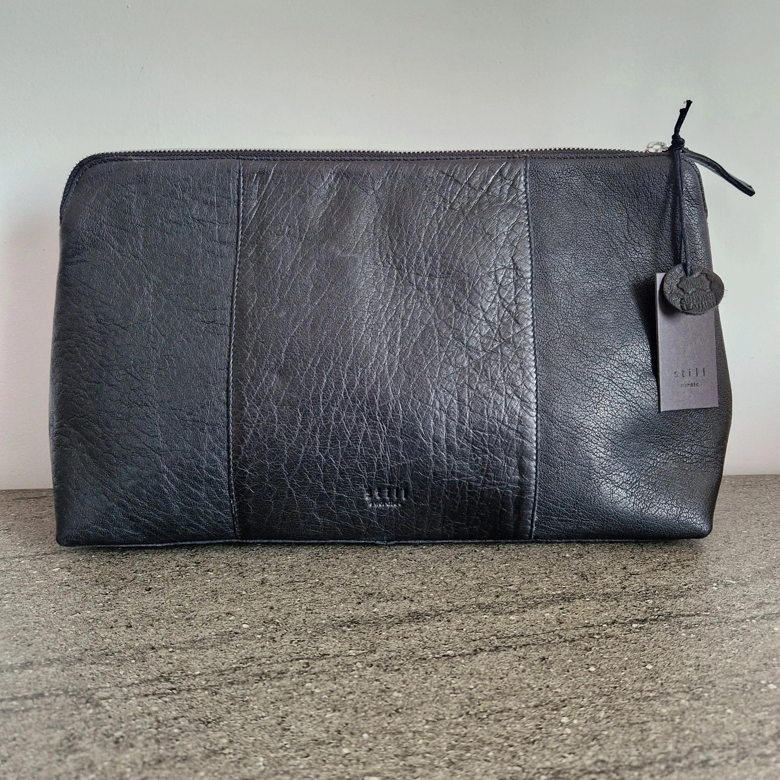 Trousse de toilette en cuir